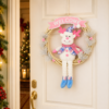 Cute Christmas Wreath Door Hanger with Plush Holiday Character and Pink Festive Banner
